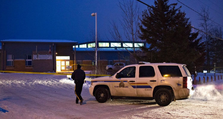 La Loche, Sask., on Jan. 23, 2016. Police investigate a school in La Loche, Sask., on Jan. 23, 2016. (Jason Franson/ THE CANADIAN PRESS)