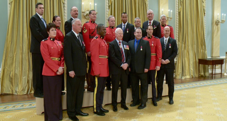  Security services members are recognized during a ceremony to pay tribute to their response efforts to the shooting events on Oct. 22, 2014 on Parliament Hill, at Rideau Hall in Ottawa on Monday, Feb. 8, 2016. (Justin Tang / THE CANADIAN PRESS)