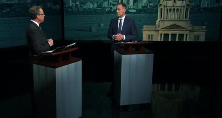 Saskatchewan Party leader Brad Wall, left and NDP leader Cam Broten squared off for a one-hour debate Wednesday night. (CBC News)