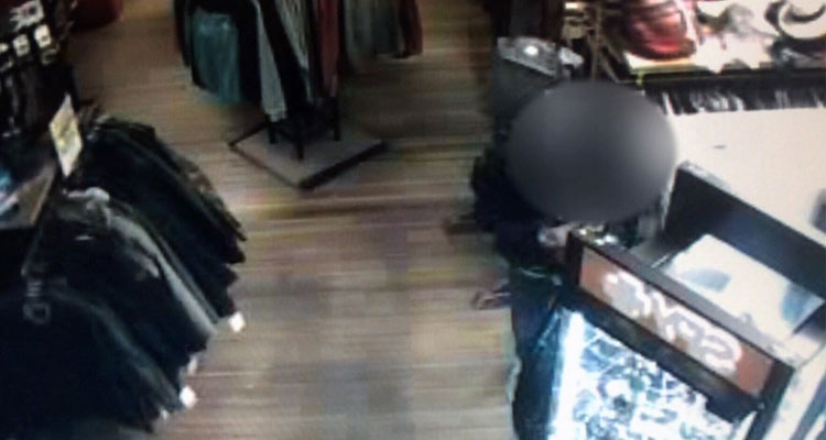 This surveillance video shows a man stealing watches from a store in Gimli, Man. (Image Courtesy of CTV News)