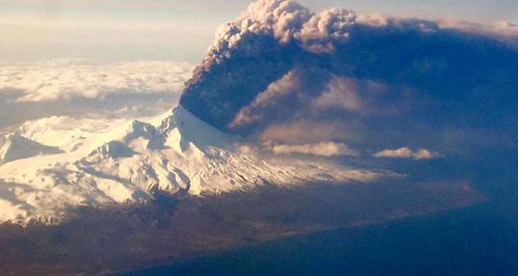 In this Sunday, March 27, 2016, Pavlof Volcano, one of Alaska’s most active volcanoes, erupts, sending a plume of volcanic ash into the air. Image Courtesy of Colt Snapp, via AP