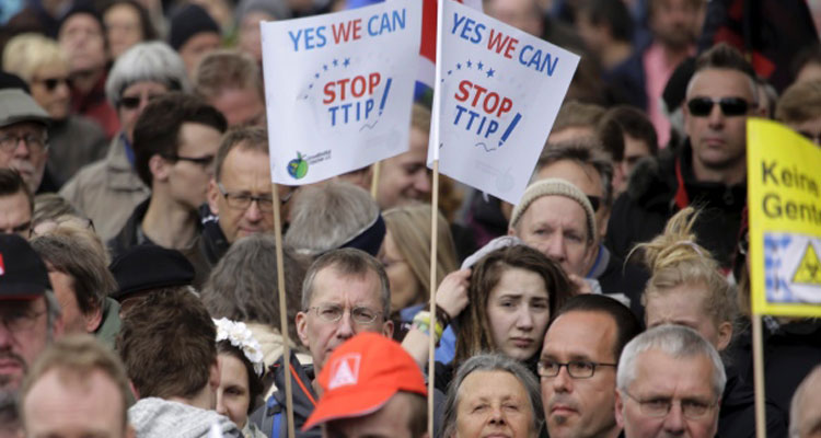 Thousands of demonstrators protest against the planned Transatlantic Trade and Investment Partnership, TTIP, and the Comprehensive Economic and Trade Agreement, CETA, ahead of a visit by U.S. President Barack Obama in Hannover, Germany, on Saturday. (Markus Schreiber/Associated Press)