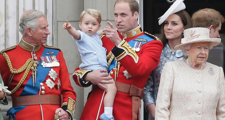 Prince William holds his son Prince George, with Queen Elizabeth, right, Kate, Duchess of Cambridge and the Prince of Wales, left, during the Trooping The Colour parade at Buckingham Palace in London on June 13, 2015. Trooping The Colour marks the official celebration of the Queen's birthday each year. (Tim Ireland/Associated Press)