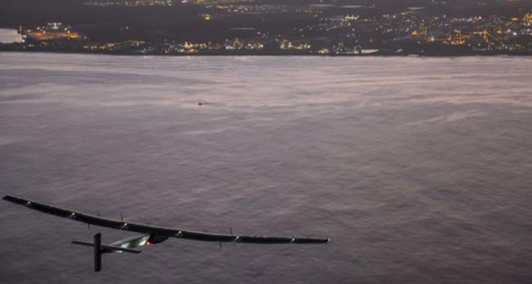 The Solar Impulse 2, powered by the sun's rays, approaches Kalaeloa Airport near Honolulu on Friday AP