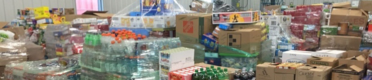 Water, dog food, diapers and canned food are among the donations for Fort McMurray evacuees. (CBC)