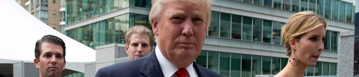 In this June 19, 2013 file photo, Donald Trump gives the thumbs up as he leaves an announcement with sons Donald Jr, Eric and daughter Ivanka in downtown Vancouver, B.C. (Jonathan Hayward / THE CANADIAN PRESS)