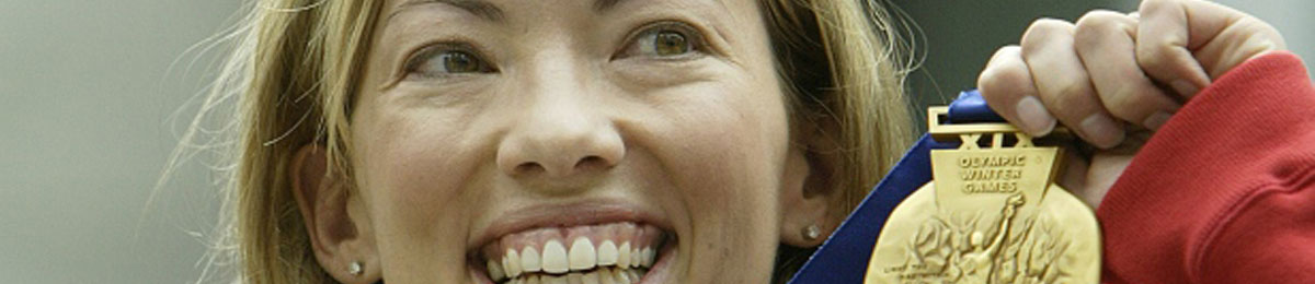 Skier Beckie Scott receives the gold medal for the 2002 Olympic Winter Games five-kilometre pursuit at a ceremony in Vancouver on June 25, 2004. Scott, who took the bronze medal in the event, was elevated to gold after Russian skiers failed their drug tests. (Lyle Stafford/Reuters)